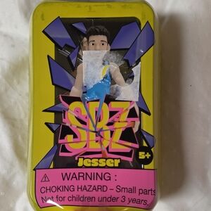 Action Figure in Blue and Yellow